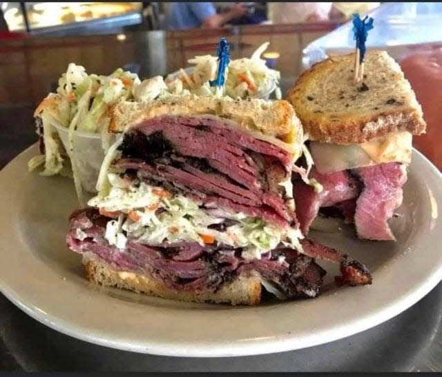 Chef Sol Shenker's house-made pastrami with Swiss cheese and house-made coleslaw on rye bread.