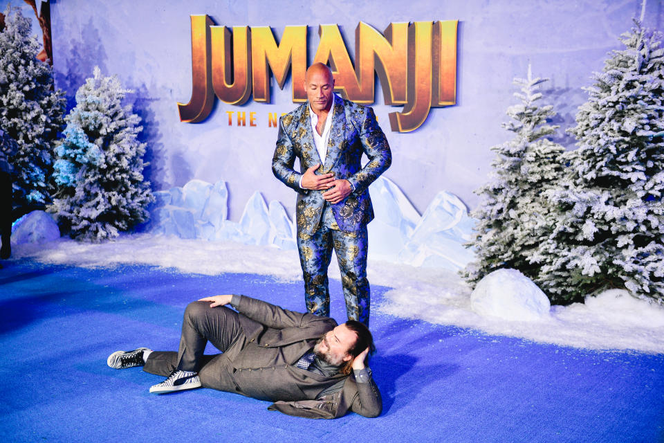 Dwayne Johnson fools around with his co-star, Jack Black. [Photo: Getty]