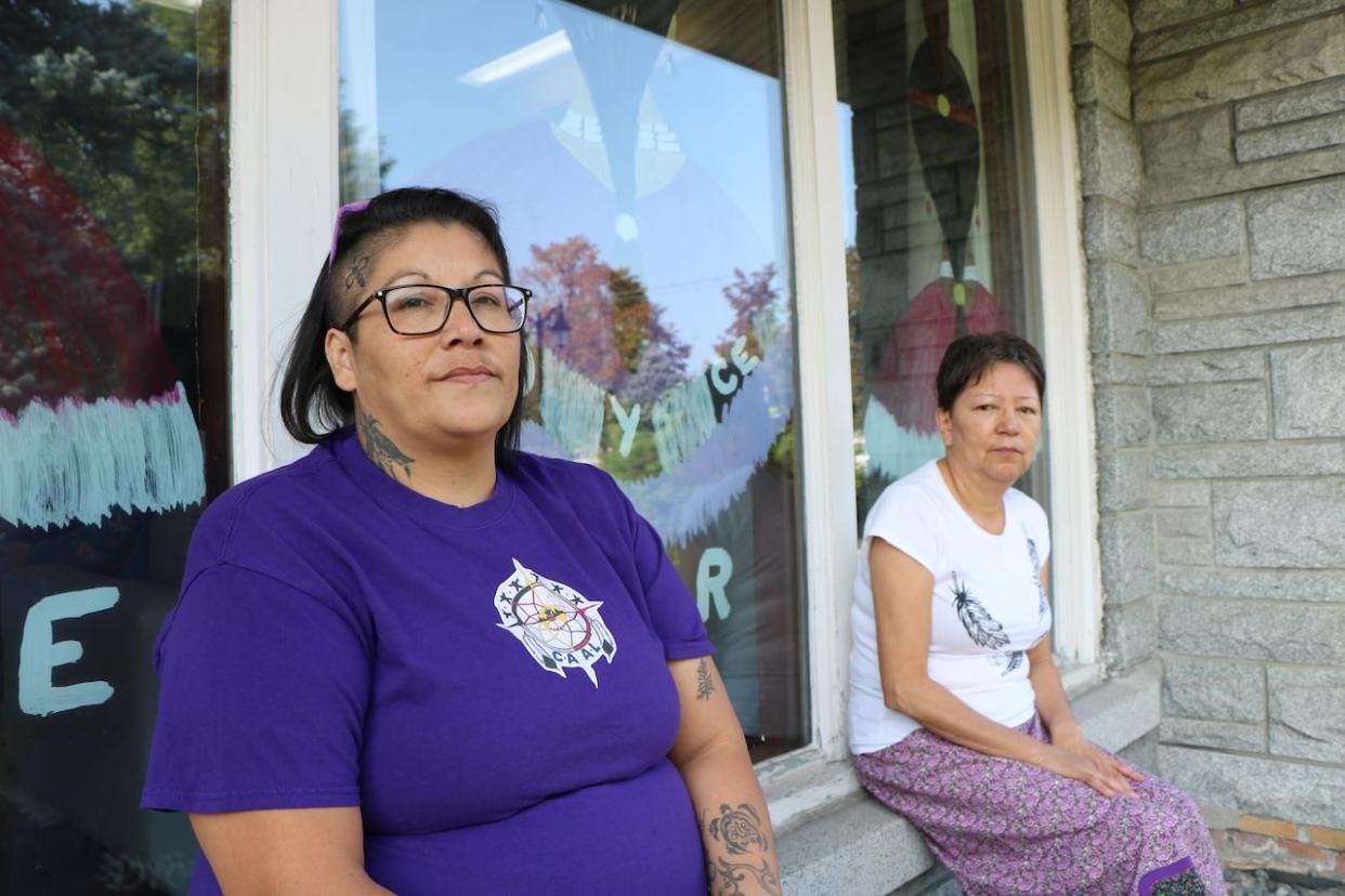 Lorraine Echaquan, a cousin of Joyce Echaquan, and Regine Dubé, a friend of the Echaquan family, said Joyce Echaquan's smile used to spread joy. (Julia Page/CBC - image credit)