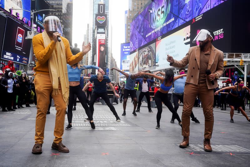 Performers take part in a pop up Broadway performance in anticipation of Broadway reopening in New York City