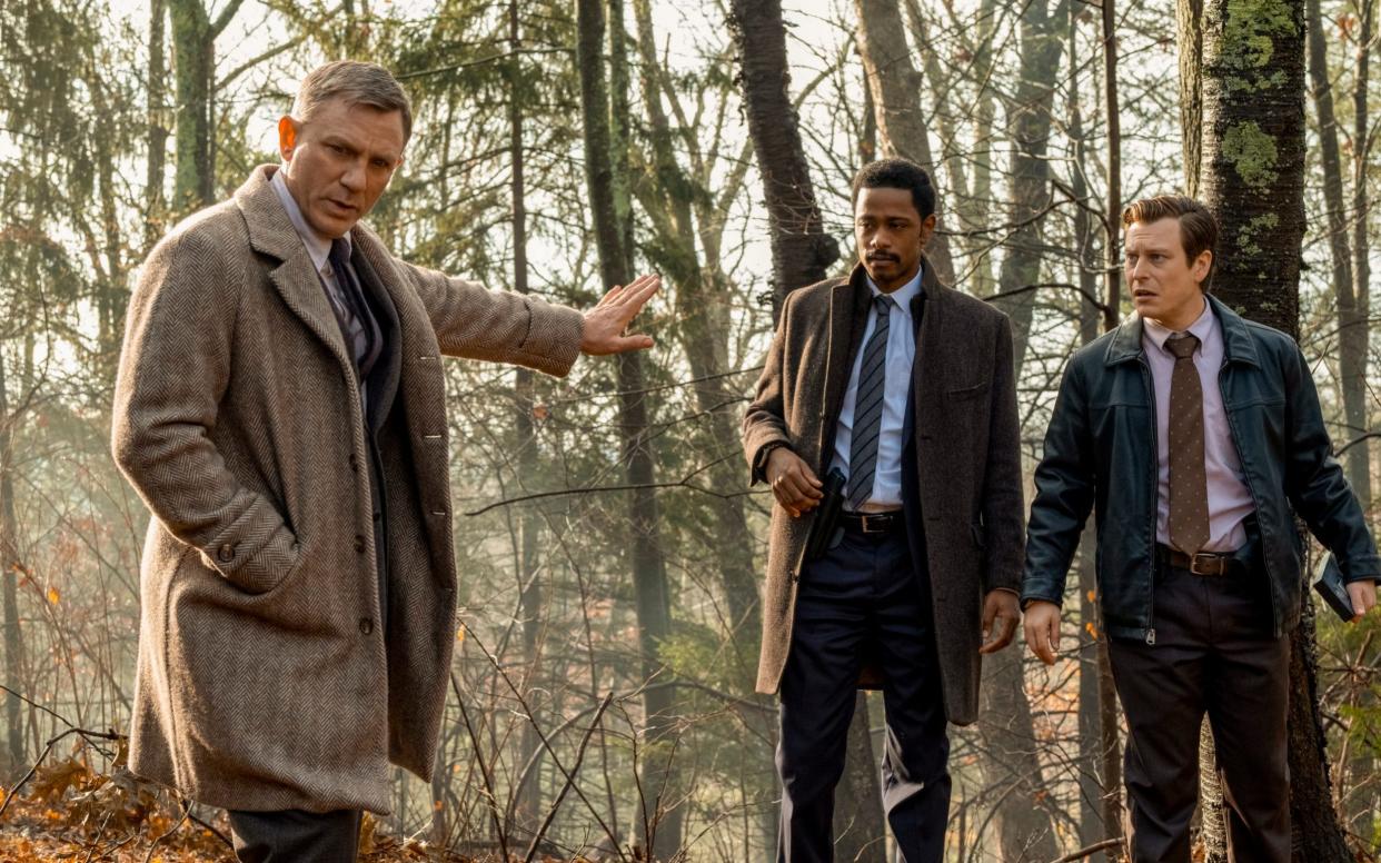 Daniel Craig, Lakeith Stanfield, and Noah Segan in Knives Out - Â© 2018 MRC II Distribution Company L.P. All rights reserved.