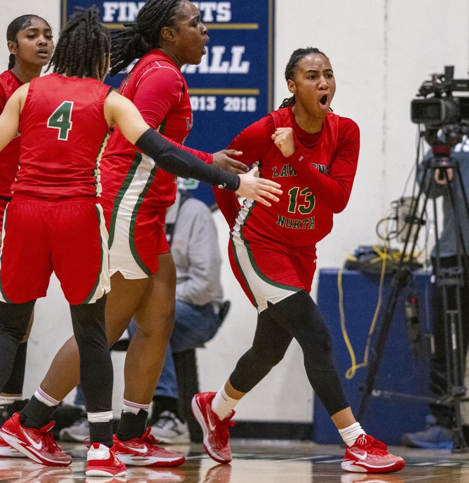 Lawrence North High School sophomore Naja Winston (13) reacts after drawing charging call against Lawrence Central High School during the second half of an IHSAA Class 4A Sectional semi-final basketball game, Friday, Feb. 2, 2024, at Cathedral High School. Lawrence Central won, 61-54.