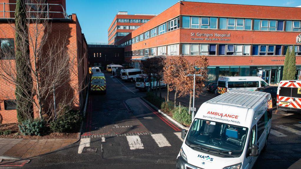 An ambulance leaves St George's Hospital in Tooting 