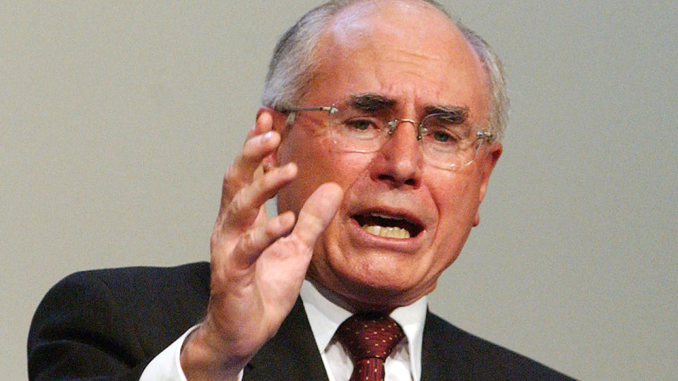 John Howard, pictured here giving a speech during the Liberal Party's victory celebrations in Sydney in 2001.