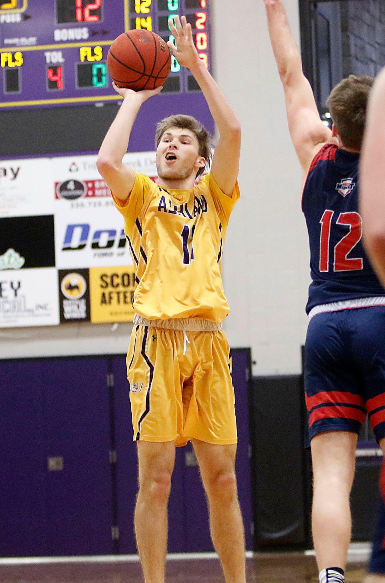 Ashland University's Hunter Shedenhelm (11) puts up a shot against Malone University during college men's basketball action Wednesday, Dec. 29, 2021 at Kates Gymnasium. TOM E. PUSKAR/TIMES-GAZETTE.COM