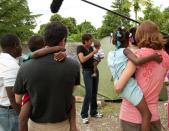 After the devastating earthquake in Haiti, Roberts and other members of the ABC News team in Haiti help find a girl who had been adopted by an American family. In this image, Roberts returns to Haiti to check in on other orphans.