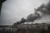 Smoke rise after shelling by Russian forces in Mariupol, Ukraine, Friday, March 4, 2022.(AP Photo/Evgeniy Maloletka)