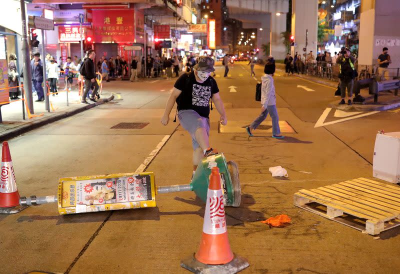 Anti-government protesters rally outside Prince Edward MTR station in Hong Kong