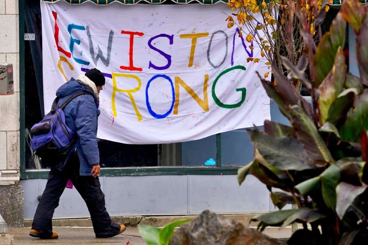 A man walks past a "Lewiston Strong" sign, Sunday, Oct. 29, 2023, in Lewiston, Maine (Copyright 2023 The Associated Press. All rights reserved)