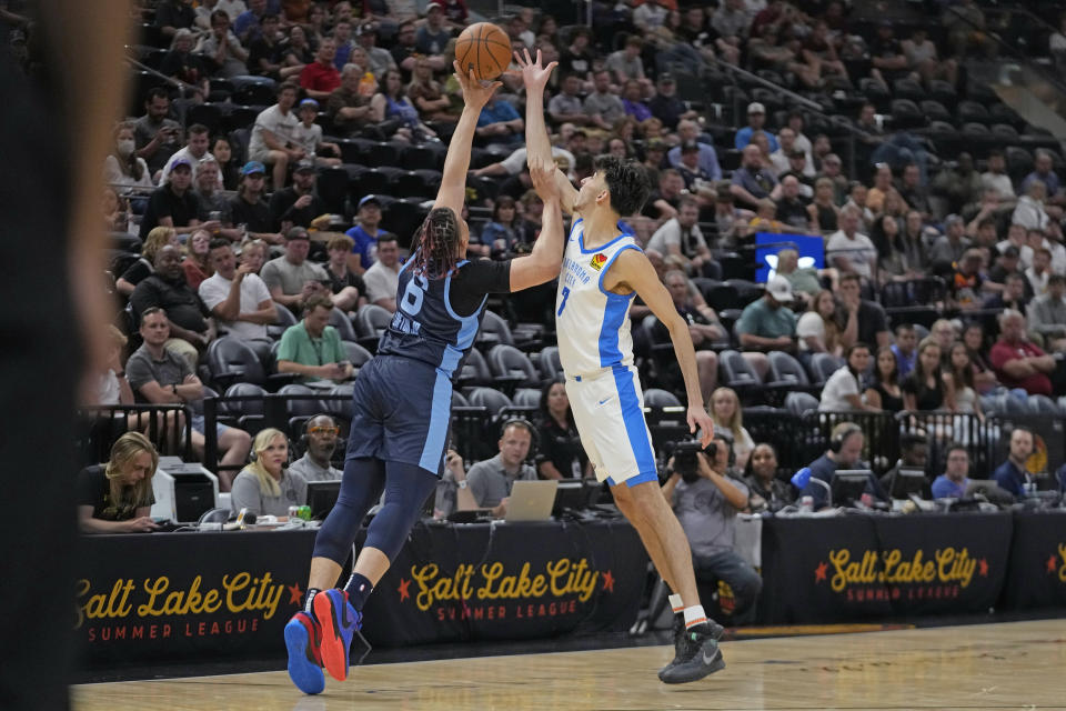 Memphis Grizzlies forward Kenneth Lofton Jr. (6) steals the ball Fromm Oklahoma City Thunder forward Chet Holmgren (7) during the second half of an NBA summer league basketball game Wednesday, July 5, 2023, in Salt Lake City. (AP Photo/Rick Bowmer)