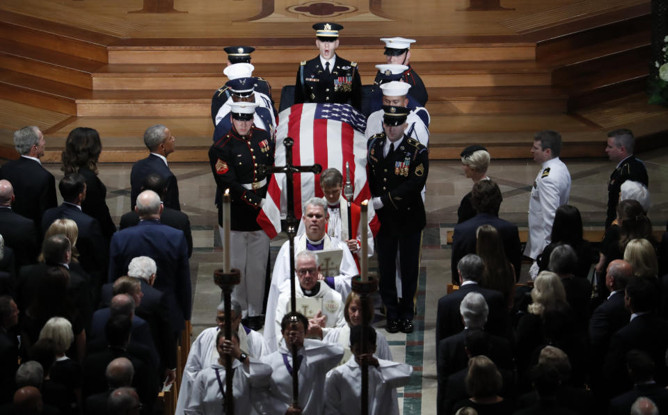 The casket of Sen. John McCain, R-Ariz., is carried during the recessional at the end of a memorial service at Washington National Cathedral in Washington, Saturday, Sept. 1, 2018. McCain died Aug. 25, from brain cancer at age 81. (AP Photo/Pablo Martinez Monsivais)