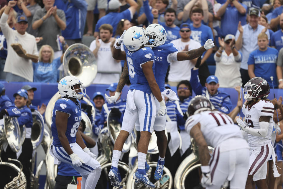 Kentucky wide receiver Dane Key (6) and wide receiver Tayvion Robinson (9) celebrate a touchdown in the end zone during the first half of an NCAA college football game against Eastern Kentucky in Lexington, Ky., Saturday, Sept. 9, 2023. (AP Photo/Michelle Haas Hutchins)