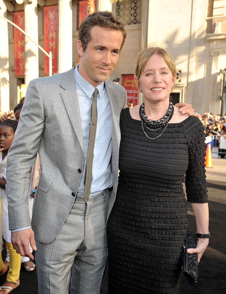 Ryan with his around his mom's shoulders on the red carpet