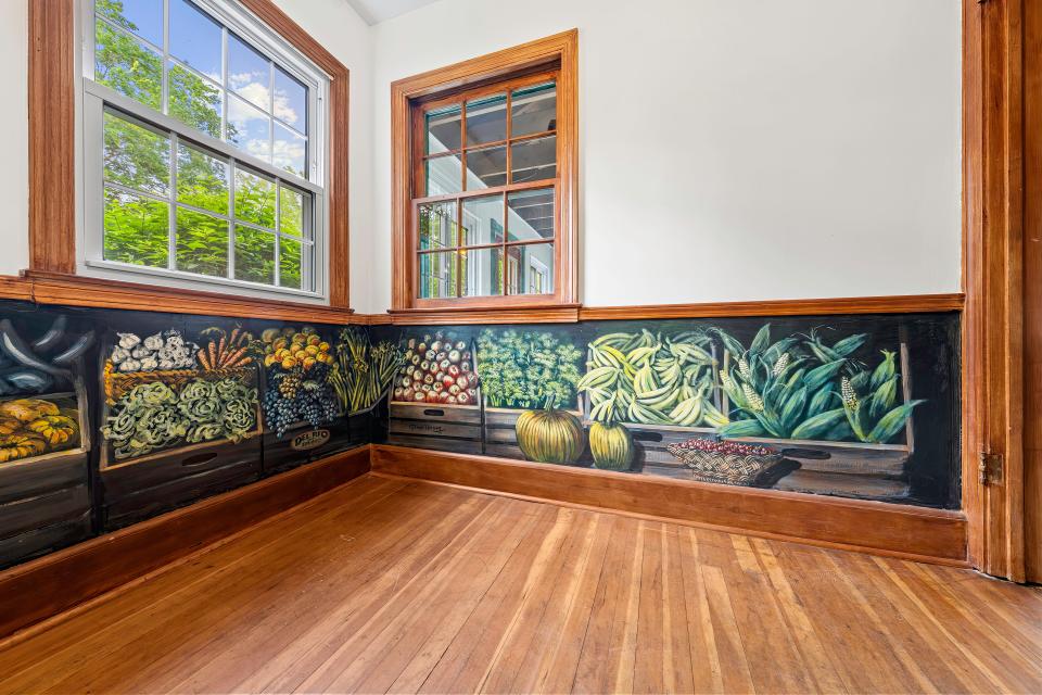 A home for sale in Akron's Kenmore neighborhood features artwork by late artist Ralph Herzog.