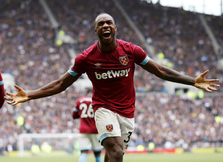 Soccer Football - Premier League - Tottenham Hotspur v West Ham United - Tottenham Hotspur Stadium, London, Britain - April 27, 2019 West Ham's Michail Antonio celebrates scoring their first goal Action Images via Reuters/Paul Childs