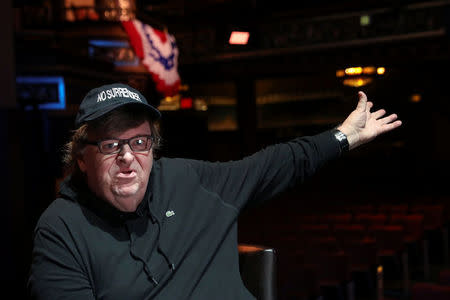 Michael Moore speaks during an interview at the site of his one-man Broadway show at the Belasco Theatre in Manhattan, New York, U.S., August 17, 2017. REUTERS/Shannon Stapleton