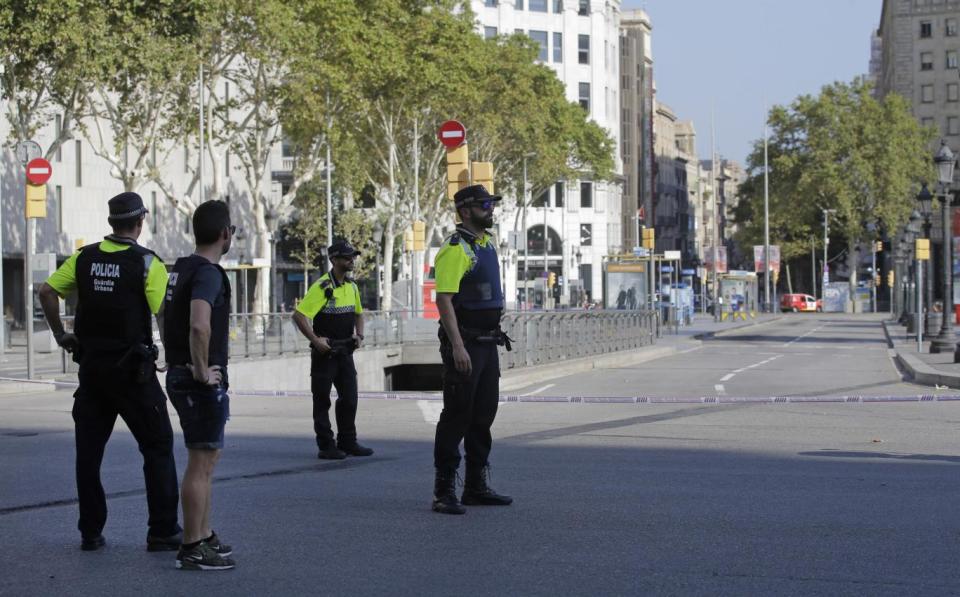 Armed police at the site of the attack in Barcelona (AP)