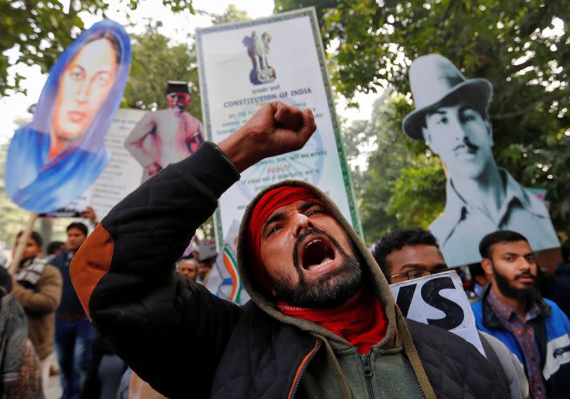 A demonstrator shouts slogans during a protest against a new citizenship law, in New Delhi