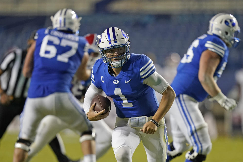 BYU quarterback Zach Wilson (1) carries the ball before scoring against Louisiana Tech during the second half on Oct. 2. (AP)