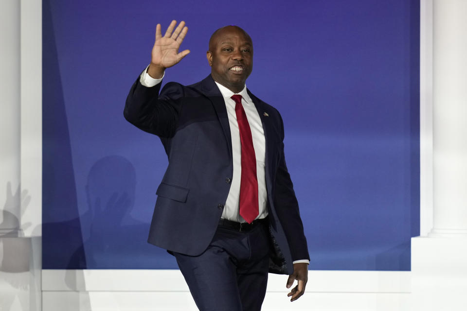 Republican presidential candidate Sen. Tim Scott, R-S.C., walks on stage at an annual leadership meeting of the Republican Jewish Coalition, Saturday, Oct. 28, 2023, in Las Vegas. (AP Photo/John Locher)