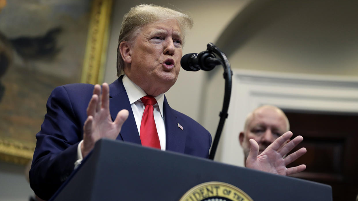 President Trump speaks to reporters at the White House