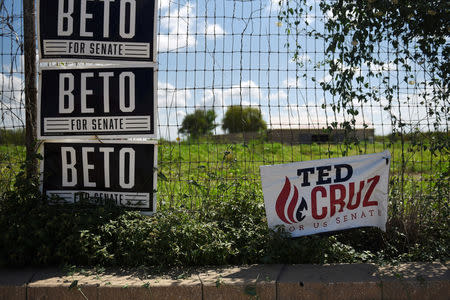 FILE PHOTO: Ted Cruz and Beto O'Rourke election signs are seen near downtown Carizzo Springs, Texas, U.S. September 5, 2018. Picture taken September 5, 2018. REUTERS/Callaghan O'Hare/File Photo