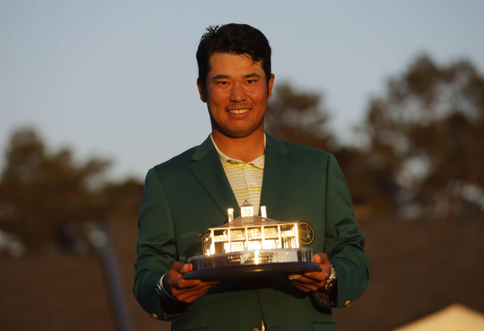 Hideki Matsuyama of Japan holds the trophy after winning the Masters golf tournament on Sunday, April 11, 2021, in Augusta, Georgia. / Credit: Brian Snyder / REUTERS