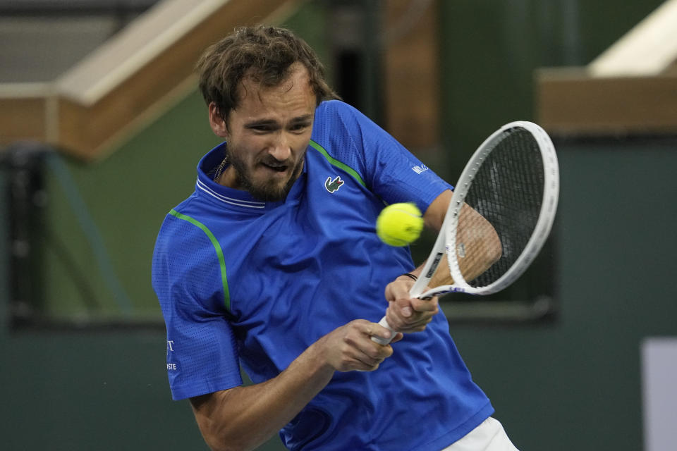 Daniil Medvedev, of Russia, returns a shot to Ilya Ivashka, of Belarus, at the BNP Paribas Open tennis tournament Sunday, March 12, 2023, in Indian Wells, Calif. (AP Photo/Mark J. Terrill)