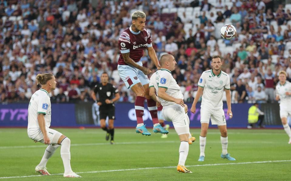 Gianluca Scamacca rises high to head his first West Ham goal against Viborg on Thursday - Getty
