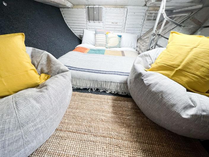 Bed in hold area of plane conversion