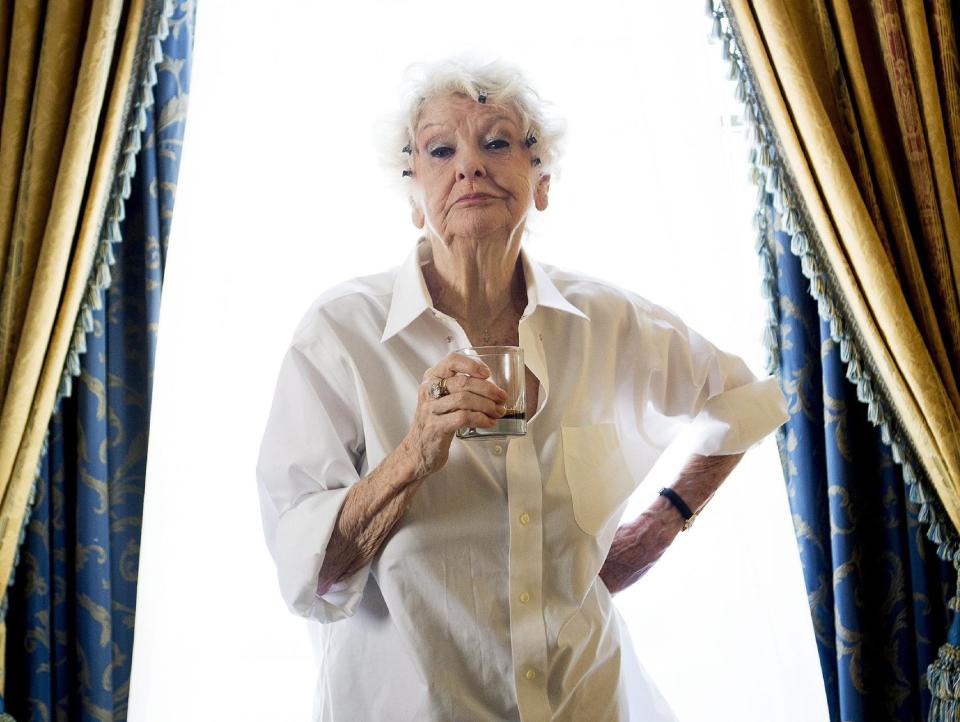 FILE - This Sept. 11, 2012 file photo shows actress Elaine Stritch posing for a photograph during the 2012 Toronto International Film Festival in Toronto. At 89, Stritch, as funny and irascible as ever, returned to New York to celebrate the opening of "Elaine Stritch: Shoot Me," delighting Broadway fans who have missed her. The film premiered in New York City theaters Friday, Feb. 21, 2014, and nationwide soon after. (AP Photo/The Canadian Press, Michelle Siu, file)