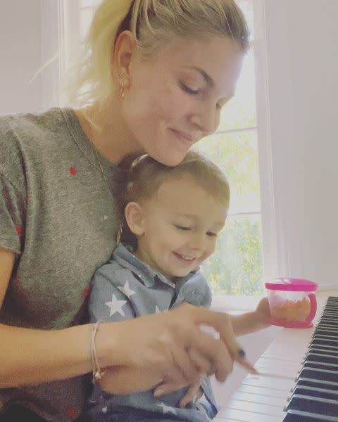 <p>Elvis is a natural behind the keys. He's already crushing "Heart and Soul" with just a little help from his mama.</p>