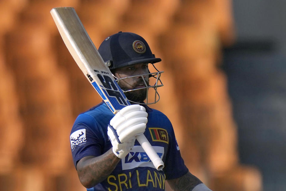 Sri Lanka's Kusal Mendis celebrates after scoring fifty during the Asia Cup cricket match between Afghanistan and Sri Lanka in Lahore, Pakistan, Tuesday, Sept. 5, 2023. (AP Photo/K.M. Chaudary)