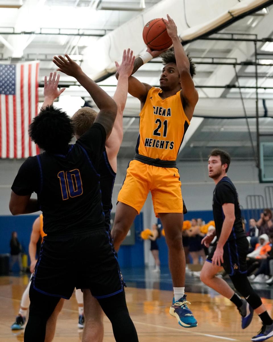 Davin Walker of Siena Heights goes up for a shot during an 82-65 loss to Madonna Wednesday night.