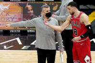 Chicago Bulls head coach Billy Donovan, left, talks with guard Zach LaVine before an NBA basketball game against the Minnesota Timberwolves in Chicago, Wednesday, Feb. 24, 2021. (AP Photo/Nam Y. Huh)
