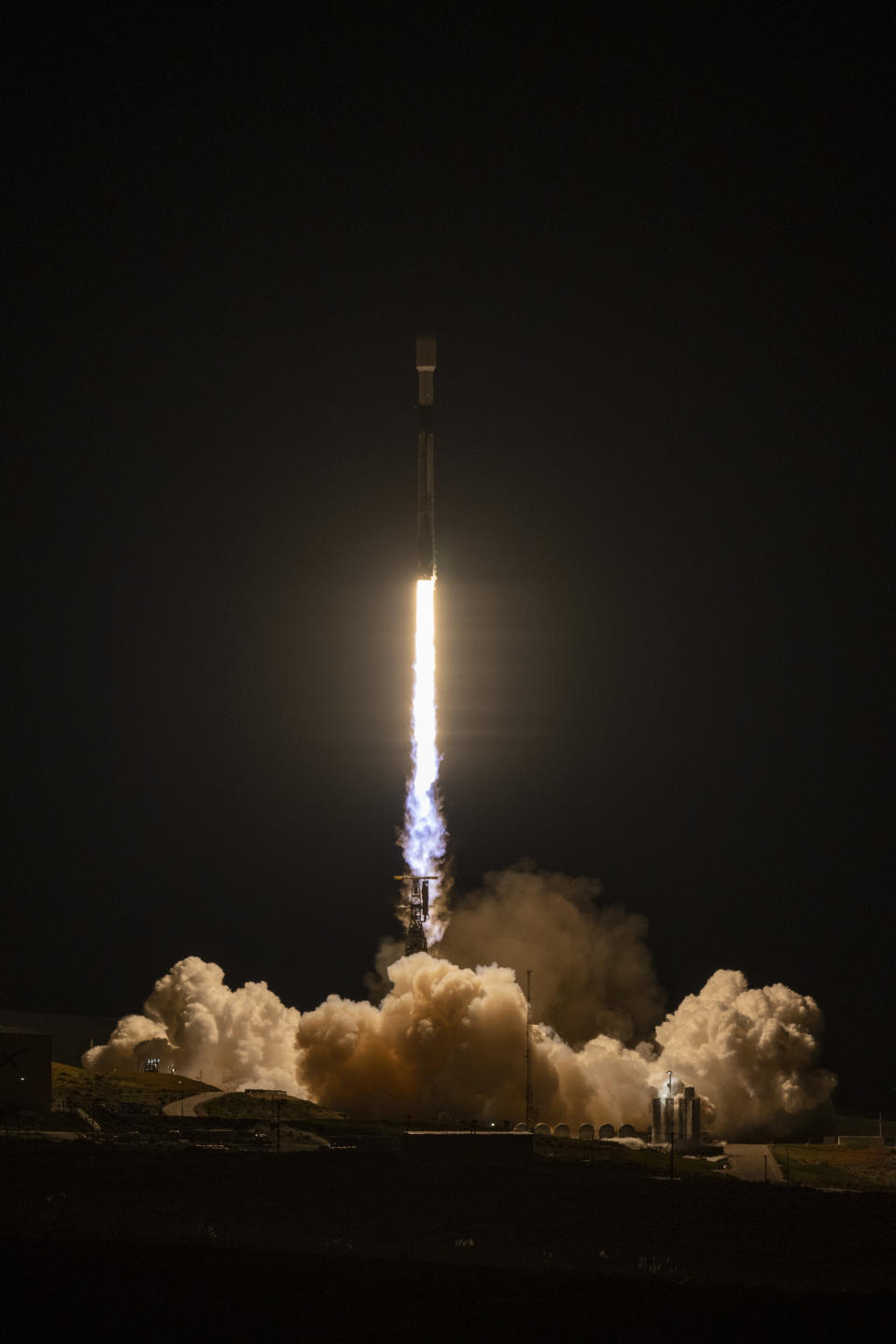 A SpaceX rocket carrying the Surface Water and Ocean Topography satellite lifts off from Vandenberg Space Force Base in California, Friday, Dec. 16, 2022. (Keegan Barber/NASA via AP)