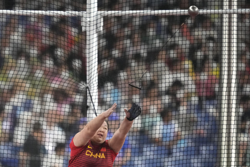 China's Wang Zheng competes during the women's hammer throw final at the 19th Asian Games in Hangzhou, China, Friday, Sept. 29, 2023. (AP Photo/Lee Jin-man)