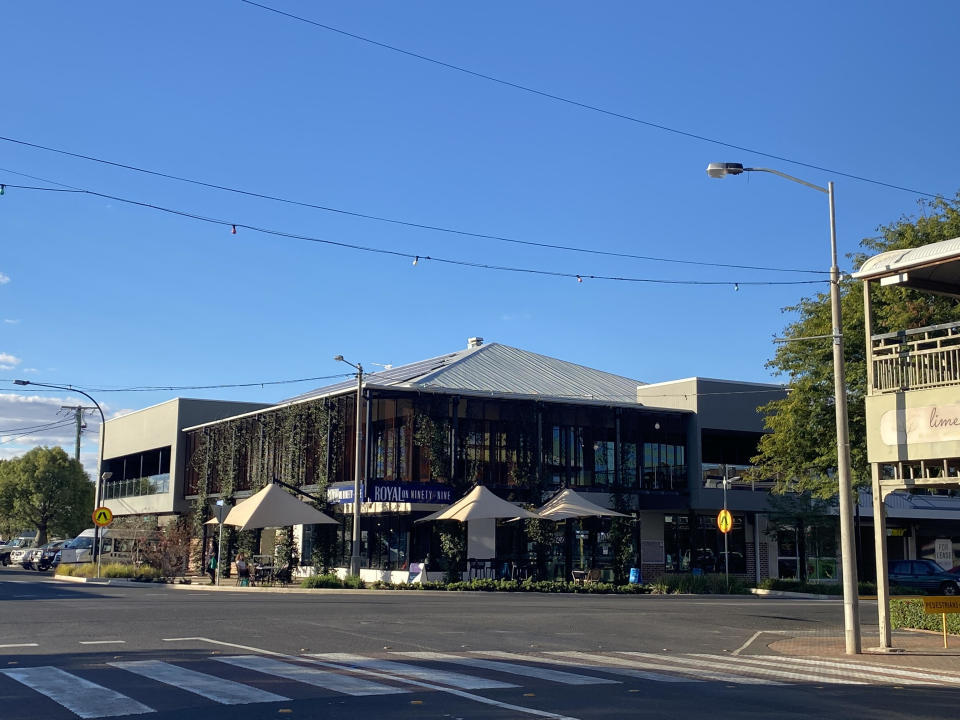 Pictured is the Royal on Ninety-Nine hotel in Roma on a sunny day. 