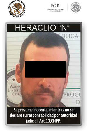 Handout photo of a man involved in the 2010 slaying of U.S. Border Patrol agent Brian Terry, in a case tied to the government's ill-fated "Fast and Furious" gun-running sting operation, distributed on April 13, 2017 by Mexico's Navy (SEMAR). The words read, "Presumed innocent until proven guilty". SEMAR/Handout via REUTERS