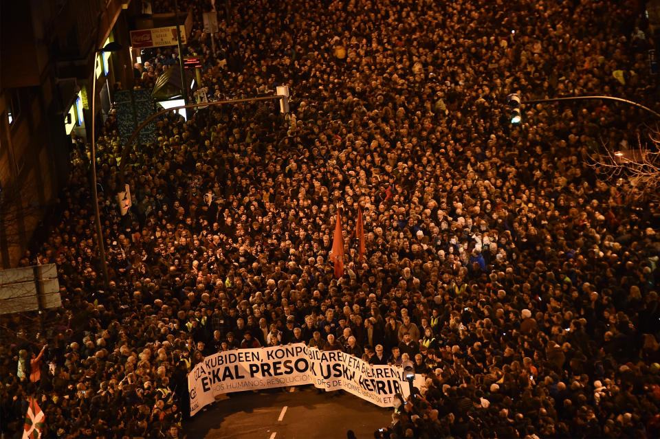 FILE - In this Jan 9, 2016 file photo, demonstrators hold a banner that reads in Basque language, "All rights for the Basque prisoners", as pro-independence Basque demonstrators demand the return of all prisoners of ETA, the Basque armed terrorist group, to the Basque Country, during a protest in Bilbao, northern Spain. Josu Urrutikoetxea, the last known chief of ETA, the now-extinct Basque separatist militant group, goes on trial Monday Oct. 19, 2020 in Paris for terrorism charges that he deems “absurd” because of his role in ending a conflict that claimed hundreds of lives and terrorized Spain for half a century. (AP Photo/Alvaro Barrientos, file)