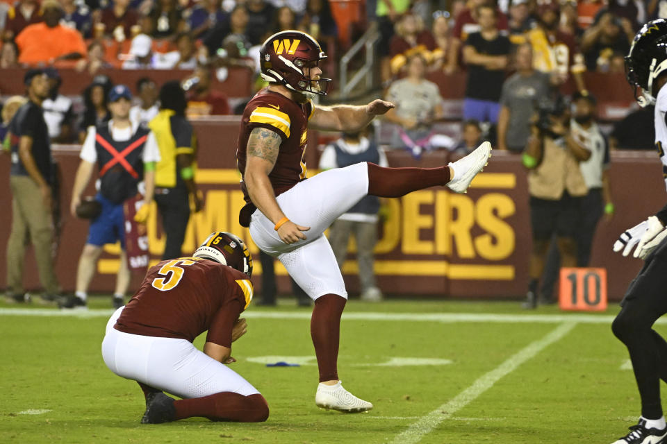 Washington Commanders place kicker Joey Slye (6) kicks a field goal against the Baltimore Ravens during the first half at FedExField. Mandatory Credit: Brad Mills-USA TODAY Sports