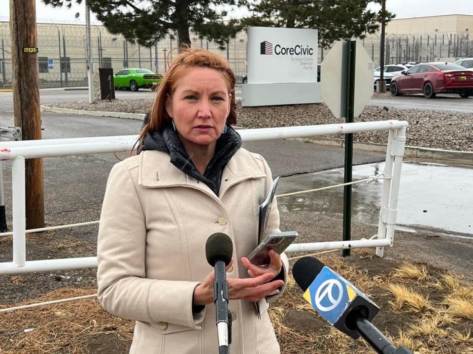 U.S. Rep. Melanie Stansbury, D-N.M., speaks to reporters in the rain outside of the Torrance County Detention Facility in Estancia, N.M. on Monday, March 21, 2022, after the private contractor CoreCivic ordered journalists off the property.