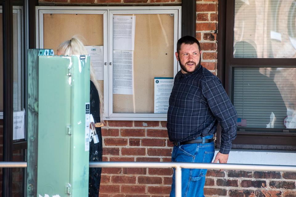 Johnathon Jessi McKinney walks into the Transylvania County Courthouse July 25, 2023. He was later found guilty on 13 counts of child sexual abuse, including statutory rape, and sentenced to 50 years in prison.