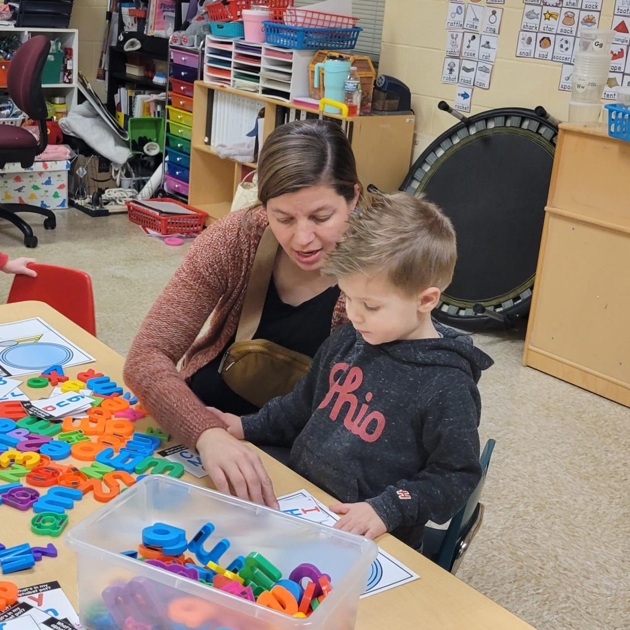 Eileen Good and her son Jack participate in a Family Literacy Night at Licking Heights Central Preschool, which recently earned a five-star Step Up to Quality rating from the Ohio Department of Job and Family Services. This is the highest rating a preschool can earn.