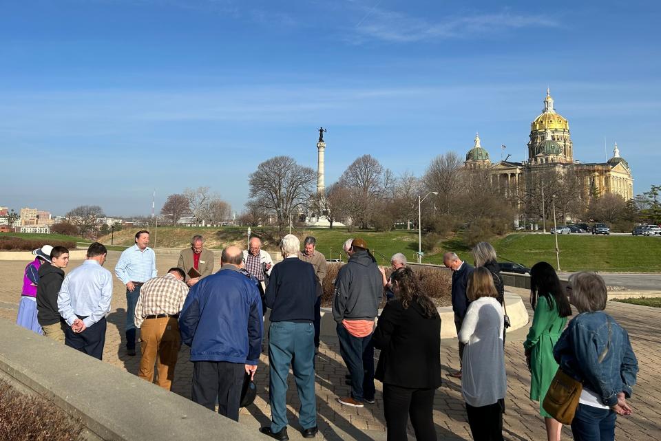 Republican activist Gary Leffler leads a group prayer outside the Iowa Supreme Court on April 11, 2023, ahead of arguments over a law to ban most abortions after six weeks of pregnancy.