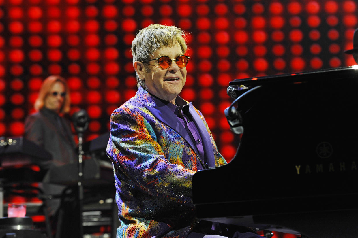 Photo by: x 2021 9/1/21 Lil Nas X to appear on Elton John's new album, 'The Lockdown Sessions'. STAR MAX File Photo: 6/7/17 Elton John performing at Genting Arena in Birmingham.