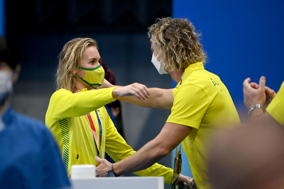 Pictured here, Ariarne Titmus and coach Dean Boxall embrace after her gold medal in the 400m freestyle. 