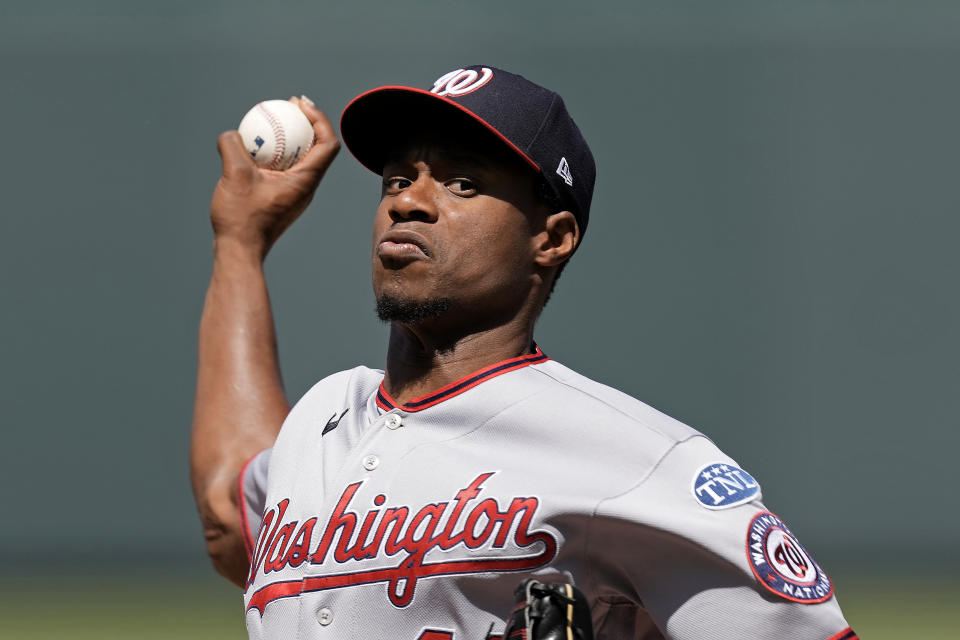 Washington Nationals starting pitcher Josiah Gray throws during the first inning of a baseball game against the Kansas City Royals Saturday, May 27, 2023, in Kansas City, Mo. (AP Photo/Charlie Riedel)