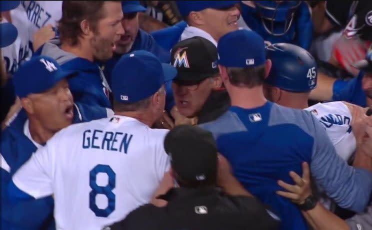 Marlins manager Don Mattingly (center) gets in the face of Dodgers bench coach Bob Geren. (MLB screen grab)