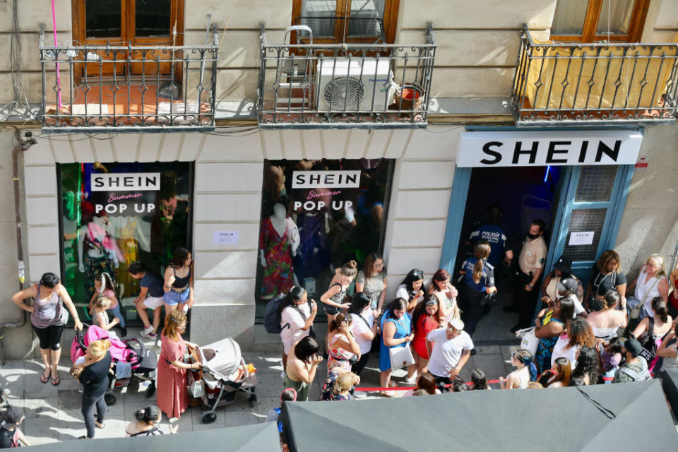 A crowd waits to enter SHEIN's first physical store in Madrid, on June 2, 2022.<span class="copyright">Cezaro De Luca—Europa Press/Getty Images</span>